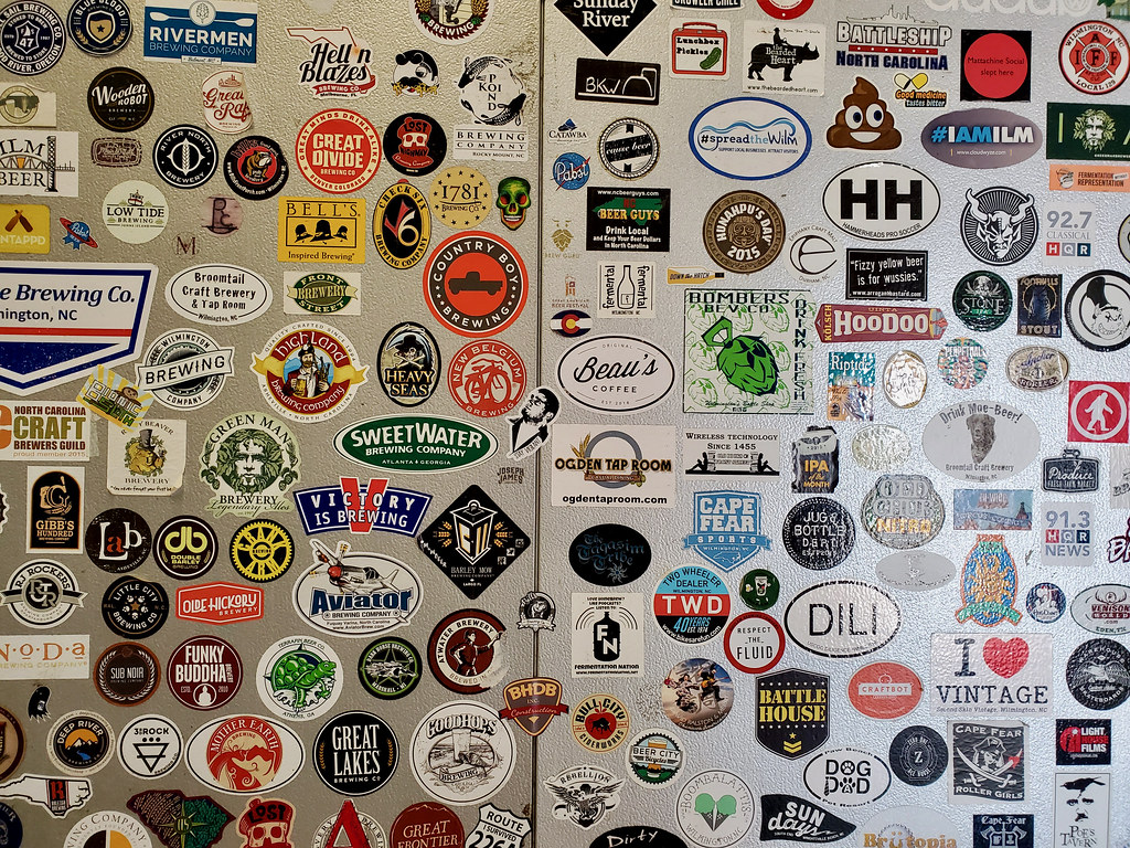 Stickers on a wall at Waterline Brewing; Wilmington, North Carolina. Photo by howderfamily.com