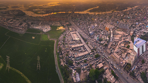 dhaka bangladesh gabtoli bus stand terminal aerial desi color sunset green urban