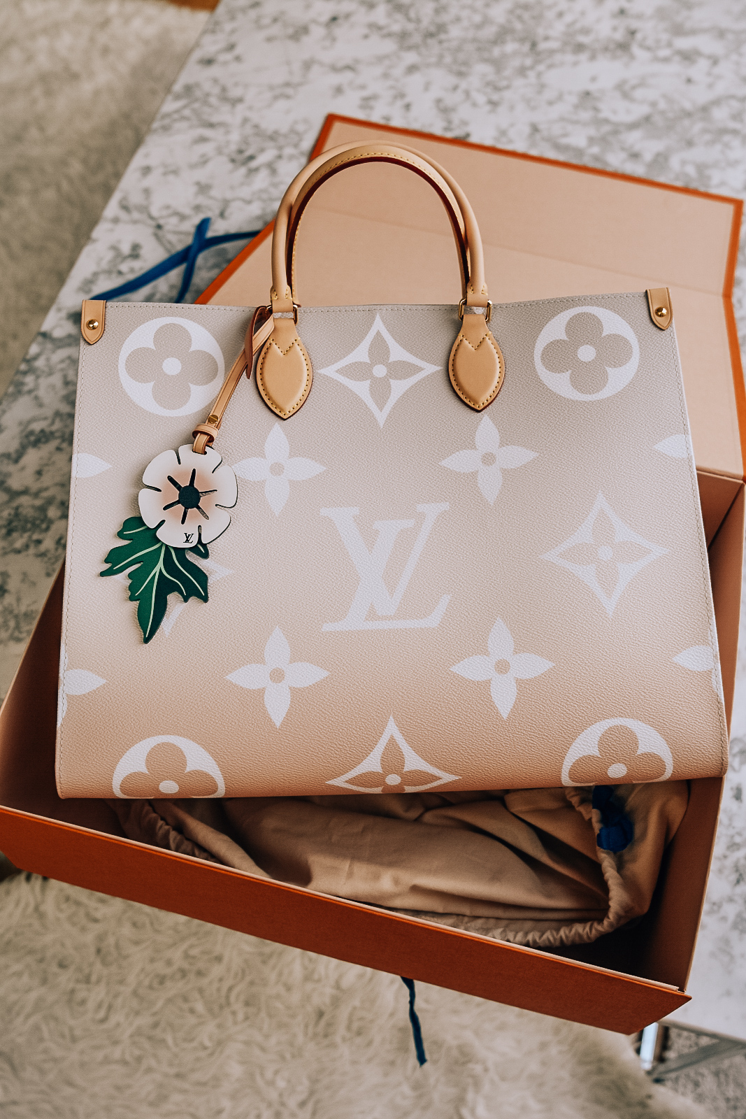 NEW IN: LUIS VUITTON ON THE GO BY THE POOL