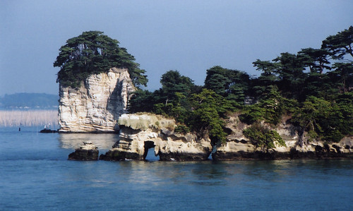 Ferries sailing back and forth from Sendai to Matsushima in Japan do a tour of the unique landforms with sea arches and islets