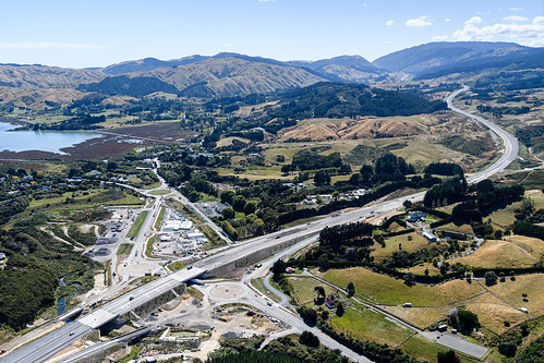The SH58 Interchange with the beautiful Pāuatahanui inlet visible behind TG's Lanes Flat site office | by Transmission Gully motorway