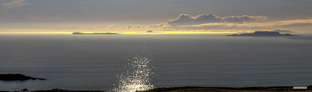 The magical Hebridean Sea as the sun begins to set, hyphenated by dream-like islands, including Staffa and The Dutchman's Cap. Taken from Gruben Cliffs on the Isle of Mull.