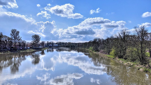 Blue sky and a few clouds over the river at Preston