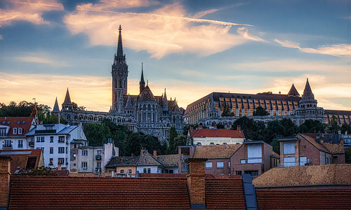 city cityscape hill roofs cathedral church temple gothic christian architecture buildings houses hotel hilltop skyline trees sky clouds sunset buda budapest hungary sony nex 5r sel1650pz lightroom topaz ai skylum luminar
