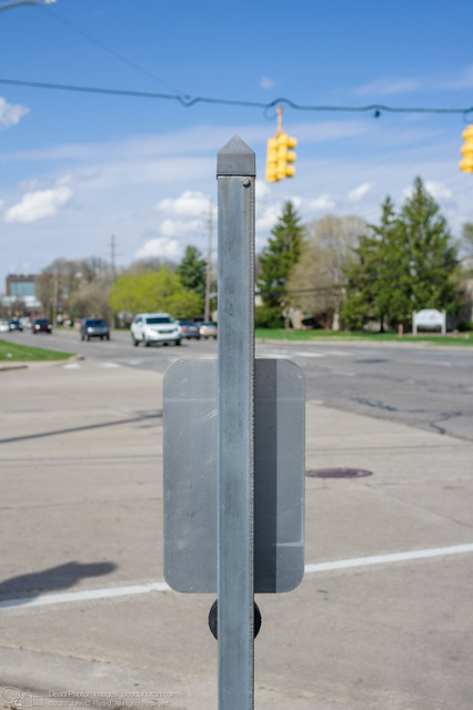 Pedestrian crossing signal button, Crooks Road and Maplelawn Drive, Troy, Michigan. April 2021