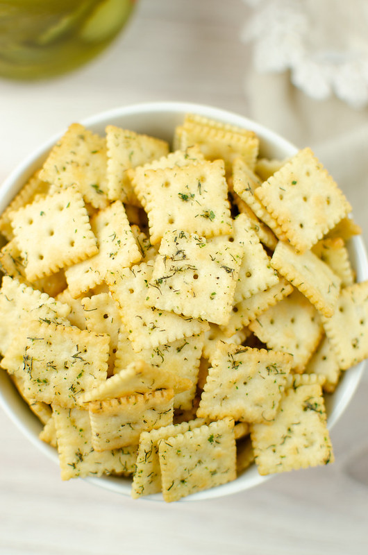 Overhead shot of dill pickle saltines in a white bowl