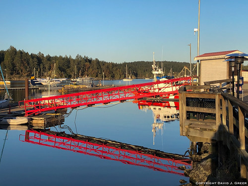 ganges bc canada water ocean sea harbour harbor red ramp dock marina reflections still calm evening sunset