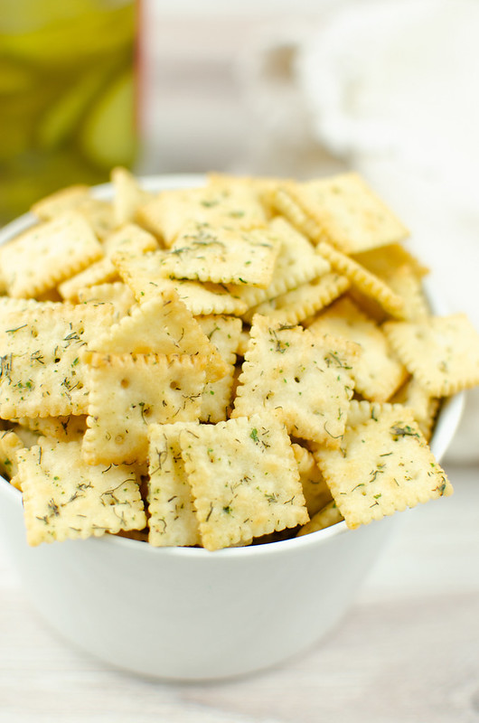 Crackers coated in a buttery dill pickle seasoning and baked until extra crispy and delicious! Dill Pickle Saltines are going to become your new favorite snack!