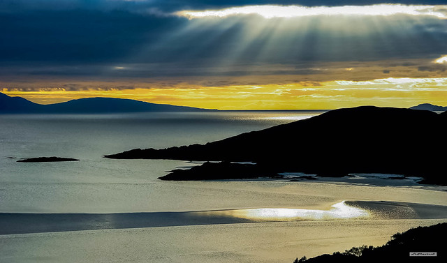 Sunset over Morar Bay and the Isle of Rum from Morar Cross. The sunsets here are breathtaking, sensational and epic, Morar, Inverness-shire, Scotland.