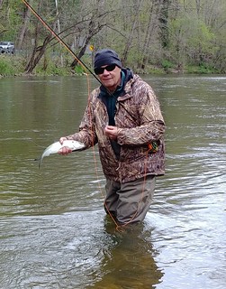Photo of man holding a shad