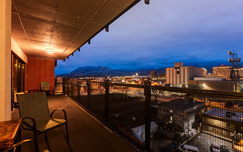 bachelorpad canon6d ef1635mm coloradosprings colorado realestate porch view night dark blue city norad chairs mountains sanden brick purple cloudy balcony