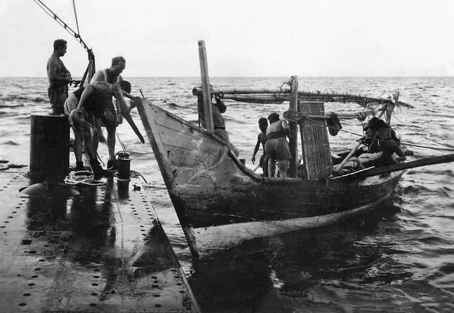 (Explored) Submarine Hr Ms K XV, encounter with a local boat, Indonesia, ca. 1944