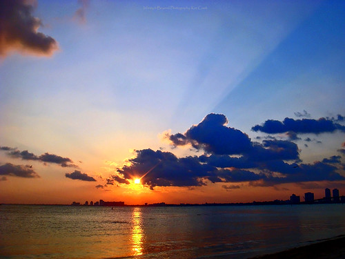 virginia key miami florida biscayne bay sun sunset crepuscular rays clouds weather ocean sea coast beach skyline horizon cloud