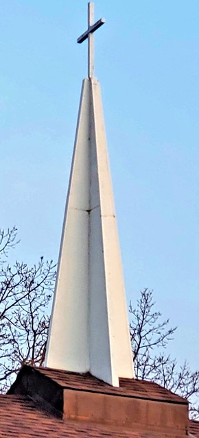 Cross atop tower