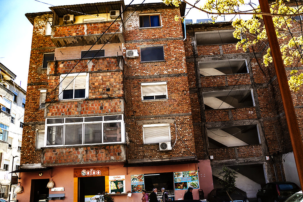 Tenement with exposed bricks on 4-25-21--Tirana