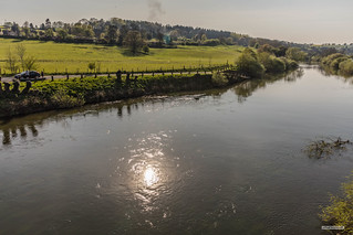A Severn Valley steam train prepares to set off towards Kidderminster in Worcestershire. The station here is for the village of Arley and this shot is taken from the foot-bridge over the River Severn at Lower Arley, nearing sunset.