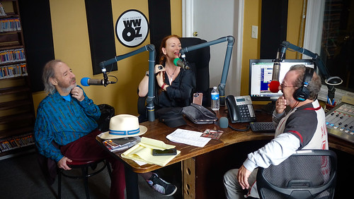Ron Phillips interviews Harry Shearer and Judith Owen. Photo by Tom Roche.