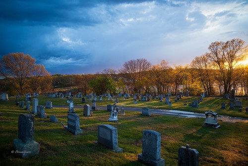 cemetery preciousbloodcemetery blackstone massachusetts ma graveyard spring clouds blue moody photographer photography creativity storytelling sunlight weather beautiful color landscapephotography landscape nature trees