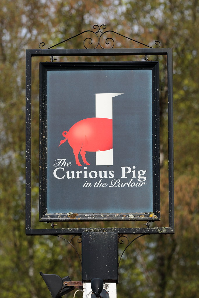 The Curious Pig in the Parlour pub sign Copthorne West Sus… | Flickr