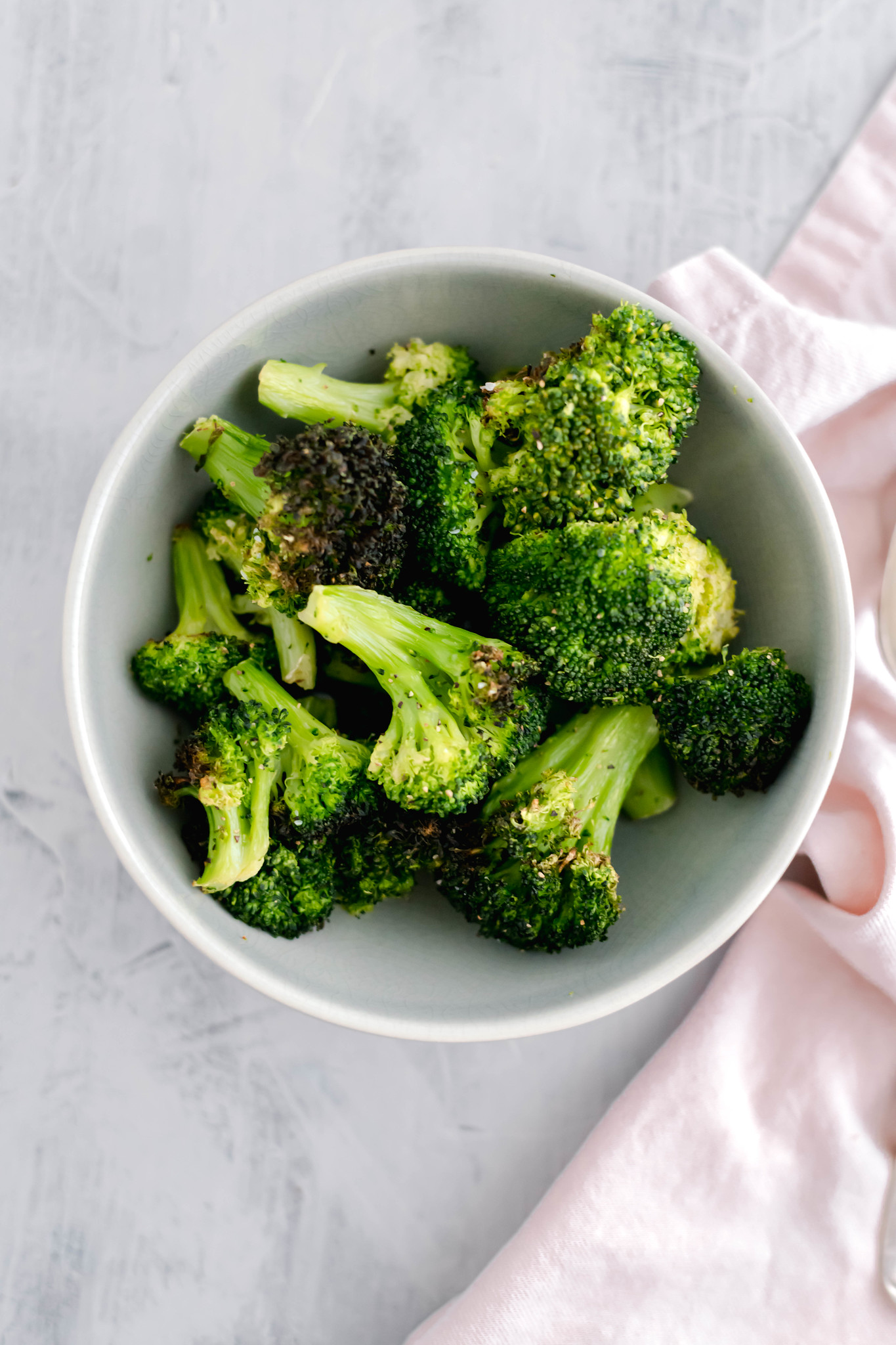 Make crisp, perfectly cooked frozen broccoli in the air fryer in minutes. The perfect easy weeknight side dish. Looking for an easy weeknight side dish? This Air Fryer Broccoli is just what you need. It starts with frozen broccoli and the cooking method results in crisp, perfectly cooked broccoli.