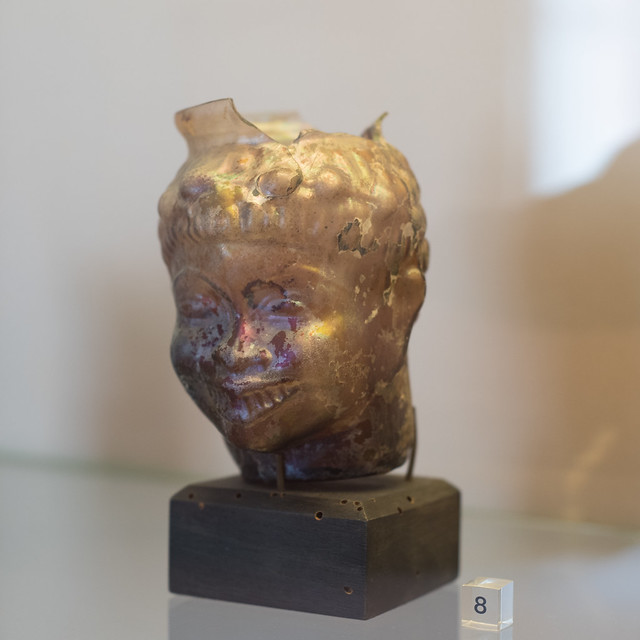 Roman glass vessel representing the head of a youth, from Pompeii 3