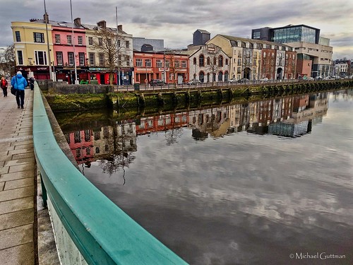 ireland cork river reflection riverlee clouds cloudysky buildings bridge peoplewalking bluejacket
