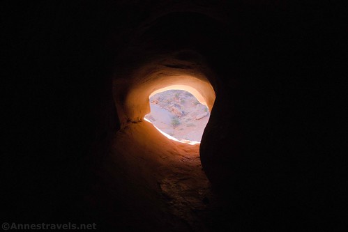 Walking toward the eastern end of The Tunnel, Arches National Park, Utah