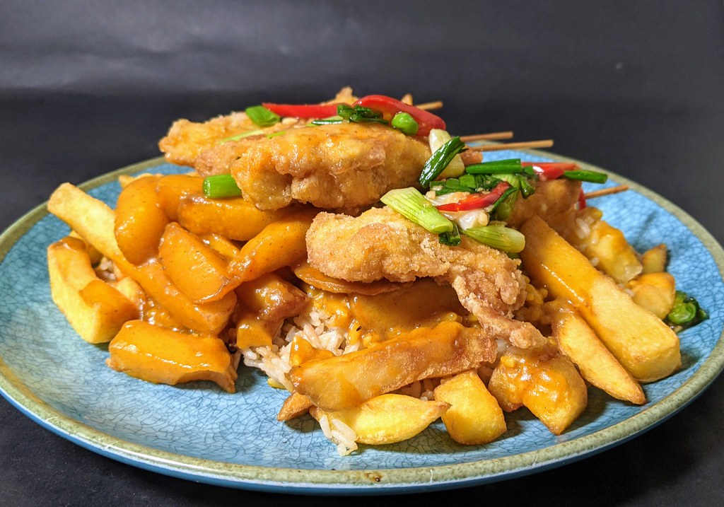 Skewered Salt & Pepper Chicken with Chips, Rice and Curry Sauce