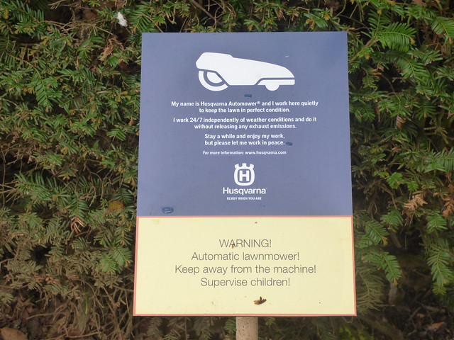Husqvarna Automower on the Great Lawn at Hidcote Manor Garden - sign