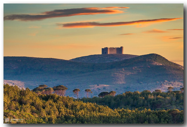 Castell in light of setting sun
