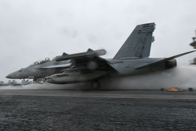 An EA-18G Growler, assigned to the “Gray Wolves” of Electronic Attack Squadron (VAQ) 142, launches from the flight deck of the aircraft carrier USS Theodore Roosevelt (CVN 71) to return to its home station onboard Naval Air Station Whidbey Island.