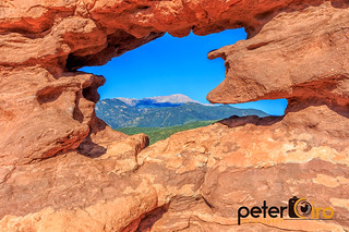 Siamese Twins Window in Garden of The Gods with Pikes Peak In The Distance