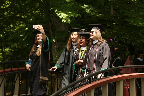 A group of friends stops to take a selfie during the Walk Across Campus.