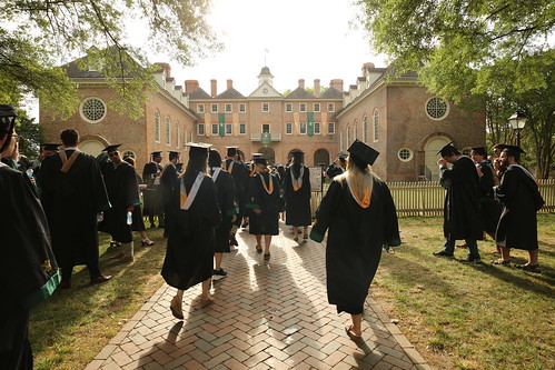 Graduates gather to begin the traditional Walk Across Campus.