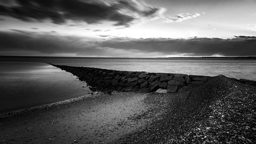 Edges B&W by Simmie | Reagor - https://www.simmulated.com/blog, On the edge of a 10-foot pile of shells.  On the edge of the shore.  On the edge of day and night.  