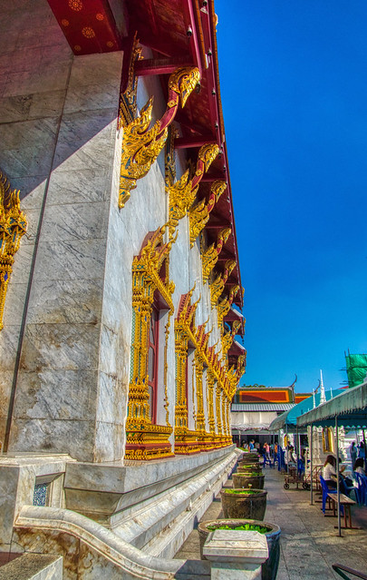 Wat Rakhang Khositaram by the Chao Phraya river in Bangkok, Thailand