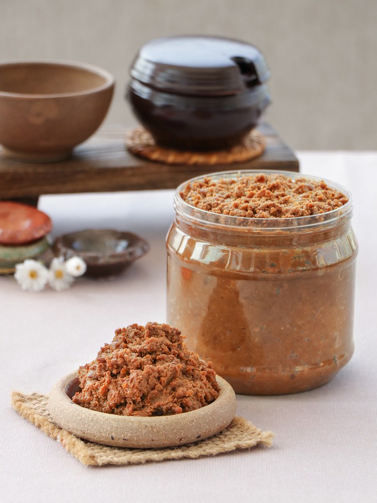 A photograph of doenjang in a jar. Doenjang vs Miso: What Is the Difference?