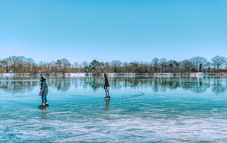 Ice skaters at De Rooije Plas, Handel, The Netherlands.