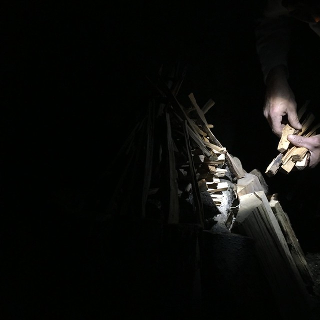 the hands of my friend, joão, building a temazcal fire
