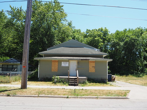 Condemned house at 1604 W 10th Street