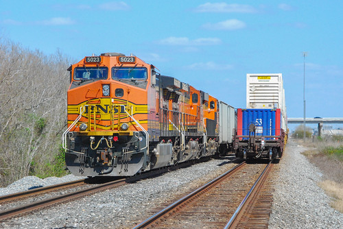 Missouri City Meet by Christopher Parma, While a KCS intermodal rolls by on Main 2, a BNSF ethanol train waits on Main 1 of UP's Glidden Sub 