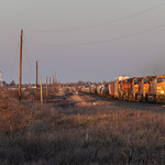 BNSF 5381 - Higgins Wrapping around the Texas Panhandle Hills, BNSF 5381 leads the lengthy manifest westbound into the sunset. Just inside of the Texas State Line, this train is leaving the small town of Higgins, TX. 5th out is FXE 4080, a SD70ACe being ran back west for power hours.

This is how the 6th day of the Spring Break West Circle ended. A great sunset providing a great golden hour. A lengthy drive, but a much needed drive to cut down time in the trip; Las Vegas, NM to Woodward, OK. Once we got to Panhandle, TX, it began to be a constant, Pull to the side of the road to shoot a train, then pull back on and continue down the road. With such a long drive being put behind us, it left 3 final days of shooting locations along the way, and driving before completing the 2021 Spring Break Circle.