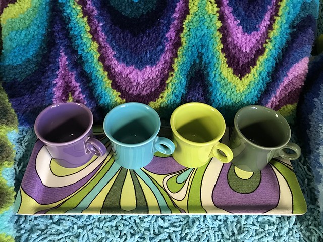 vintage fiberglass tray with Fiestaware mugs with latch hook pillow