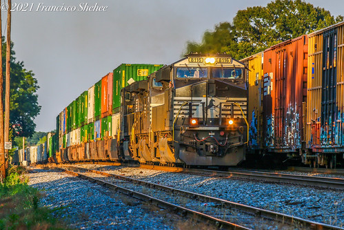Shadows of the Sunset by fshehee19, After following 134 south out of Altavista, a trio of NS GE's brings 211 through Greensboro and the