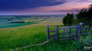 Blue hour light on the South Downs Way as it reaches the top of Old Winchester Hill, Hampshire, UK
