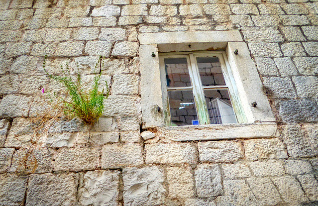 Window in the wall, Omis, Croatia