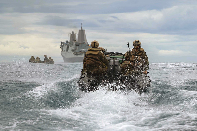 Marines execute small boat drills with USS New Orleans (LPD 18) in the Philippine Sea.