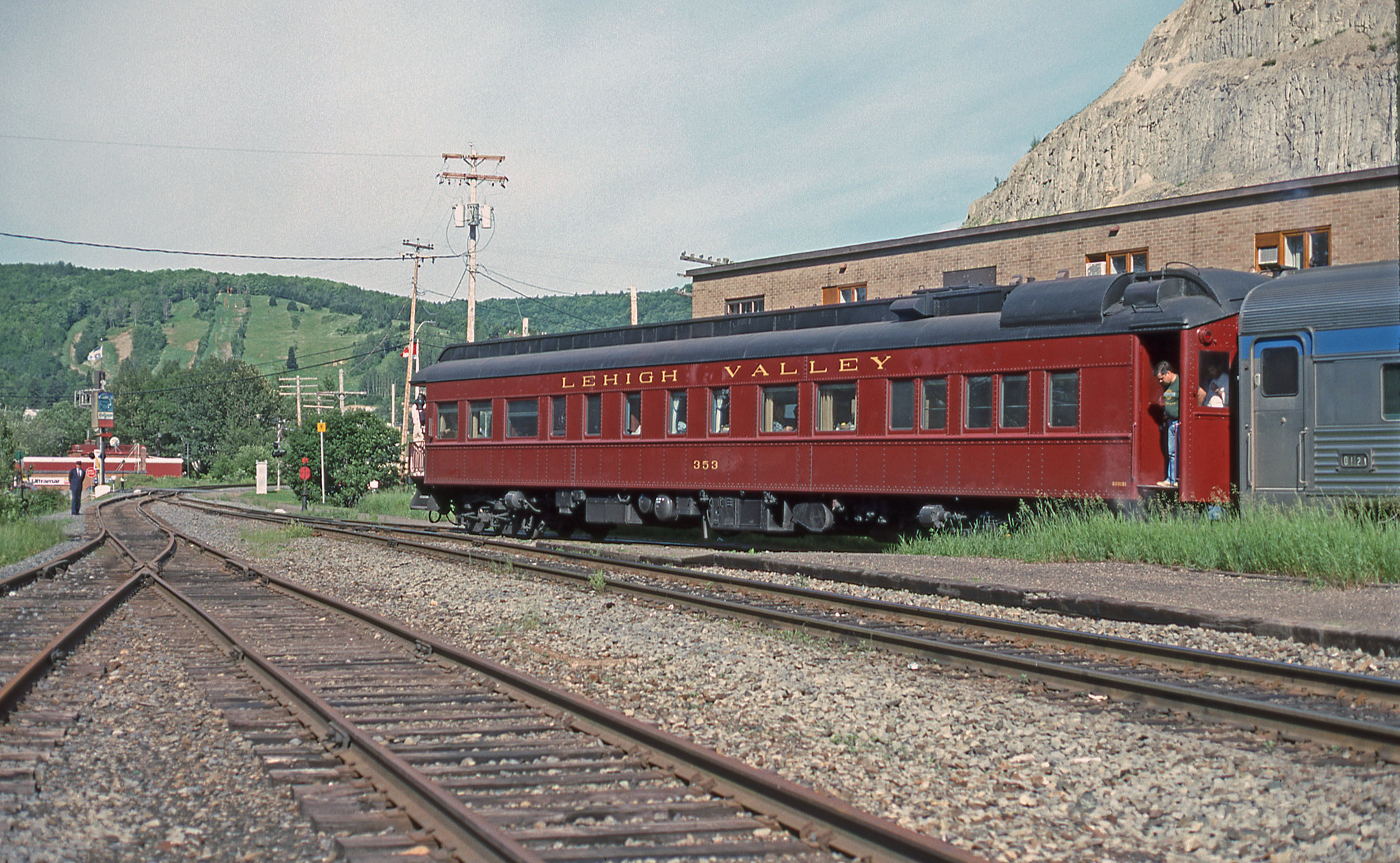 Lehigh Valley 353 Black Diamond on VIA # 16, the Chaleur.

Note that the flag is out on the left.

Matapedia, Quebec.
Sunday, July 1, 1990.
