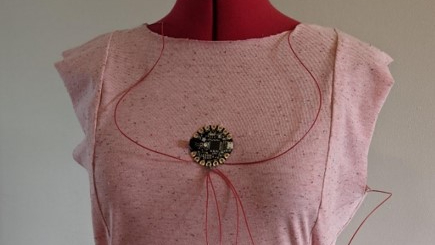 Pink top with thread