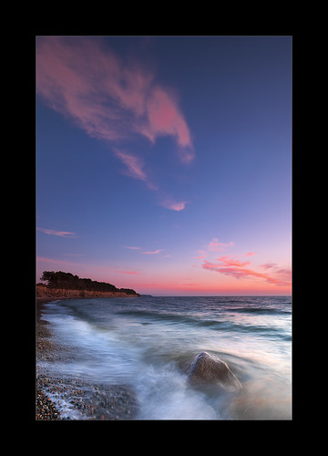 rügen germany balticsea clouds sky sunset rock cliffs beach waves pebbles blue red